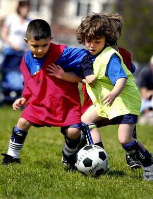 The Rockets Christian Puga (left), 5, battles the Speedy Bears Quinlan Christian, 4, during their Nisqually Booters Spring Super Mod recreation league soccer match Saturday at 
William A. Bush Park.
(Photo By Toni L. Bailey/Lacey Today))